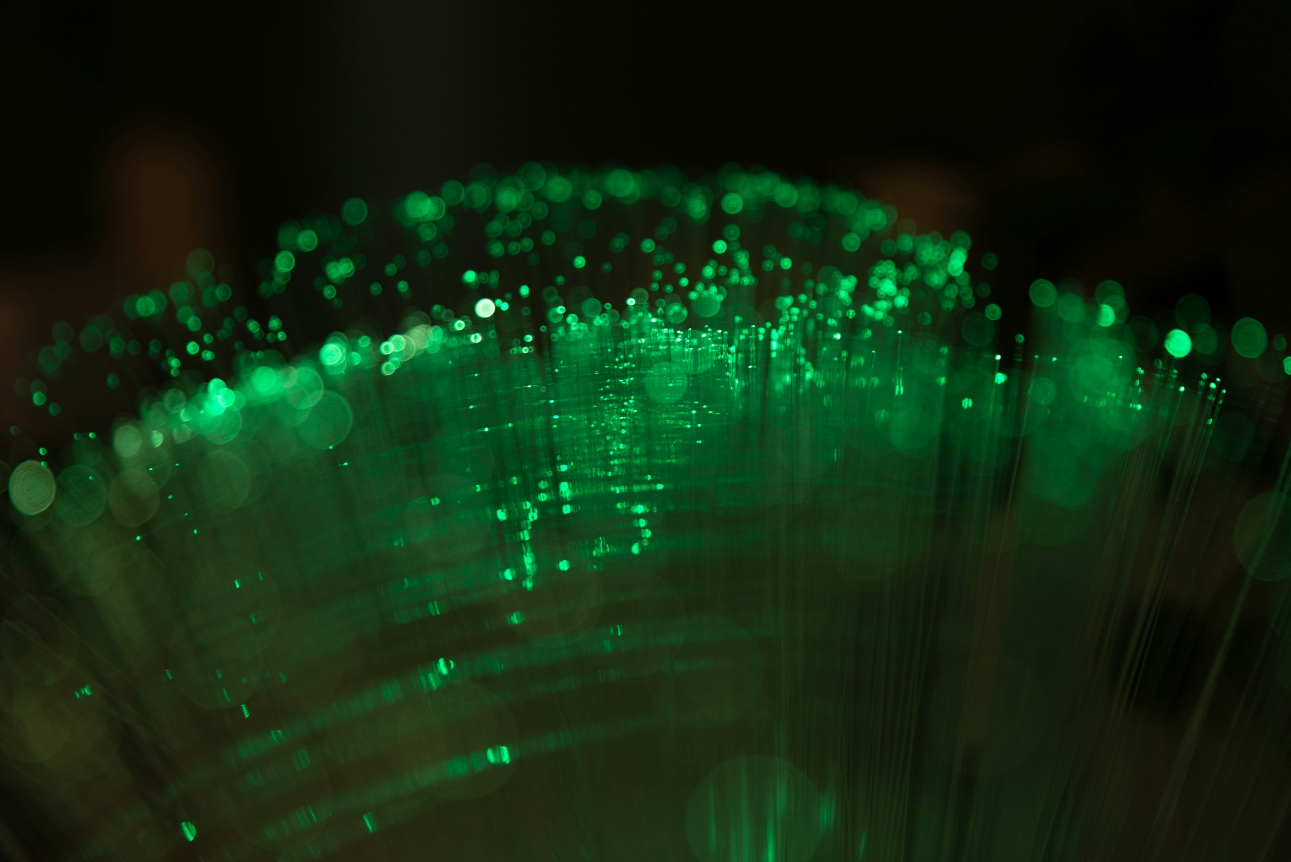 Green fibre-optic strands glowing