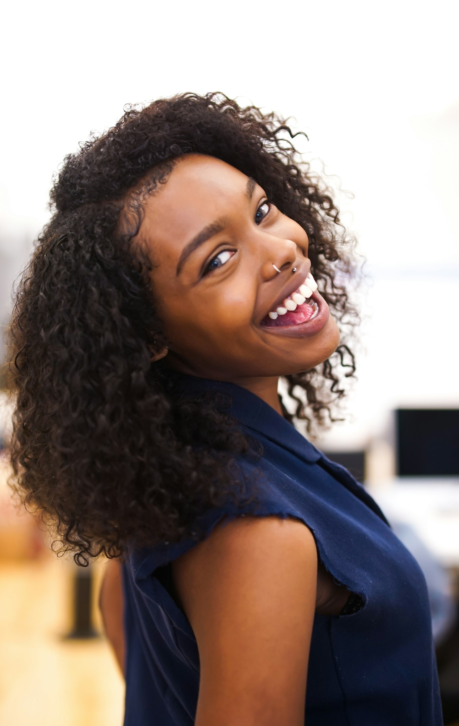 Smiling young woman in an office